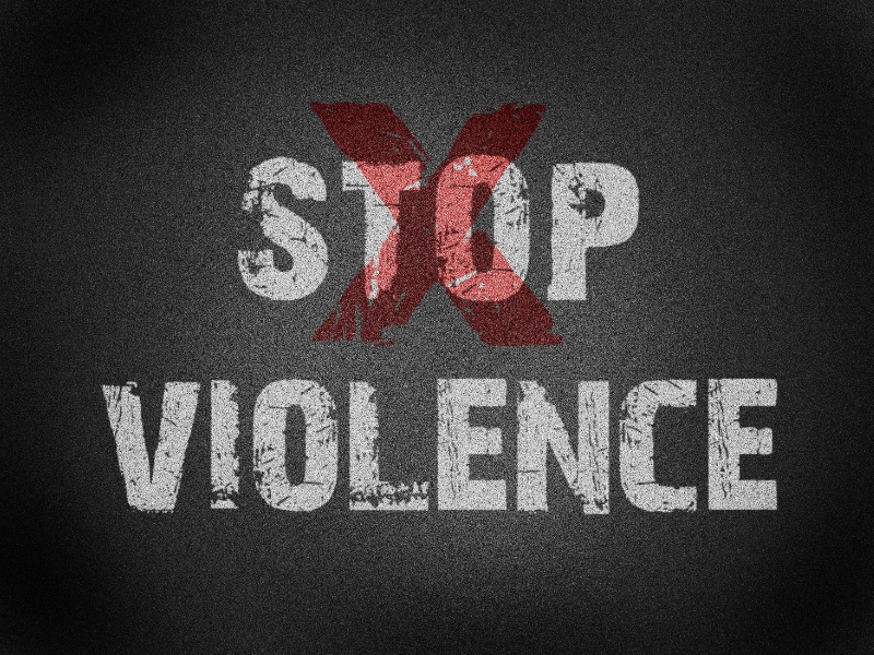 Grungy textured graphic with the words 'STOP VIOLENCE' and a large red 'X' overlaying the word 'STOP', symbolizing a strong anti-violence message.